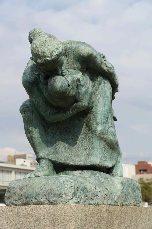 Statue of Mother and Child in the storm